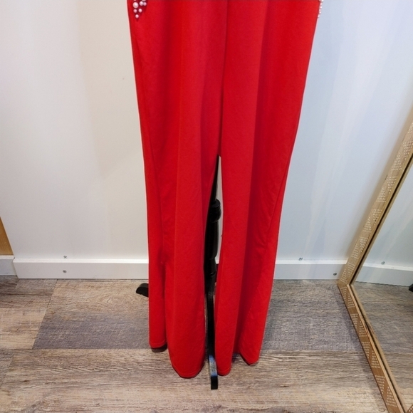 Red Jumpsuit with pearl and plunging back - Picture 7 of 9
